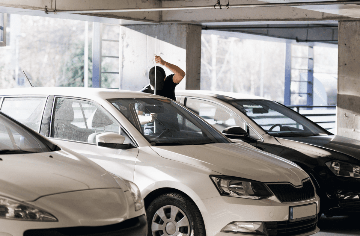 Man trying to break in and steal a vehicle